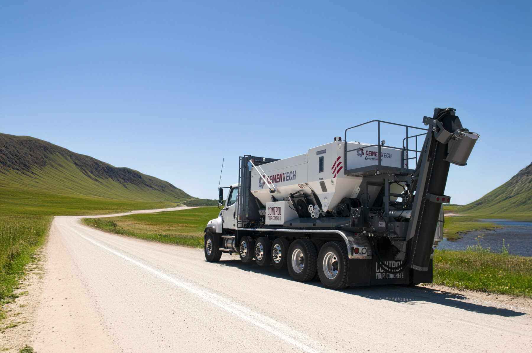 C60 volumetric mixer mobile mixer truck driving down road