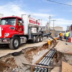 utility work with volumetric concrete mixer